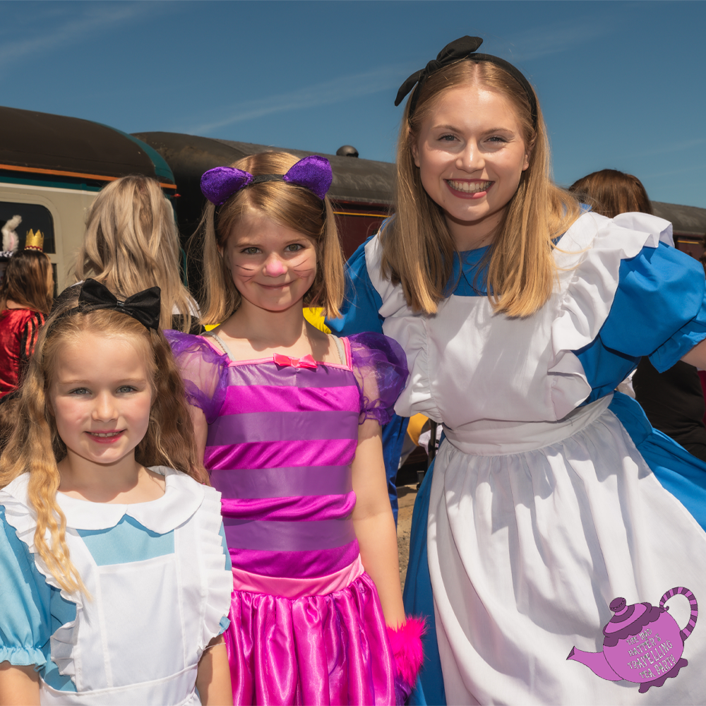 Alice with guests dressed up as characters