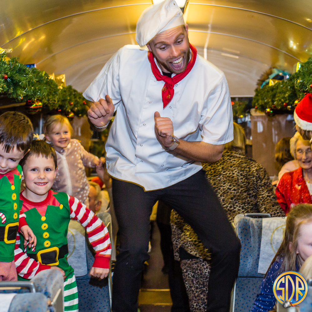 Chef dancing on board The Polar Express