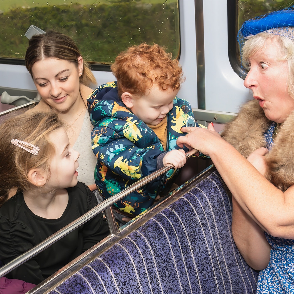 actors with young audience members at down the herriot line