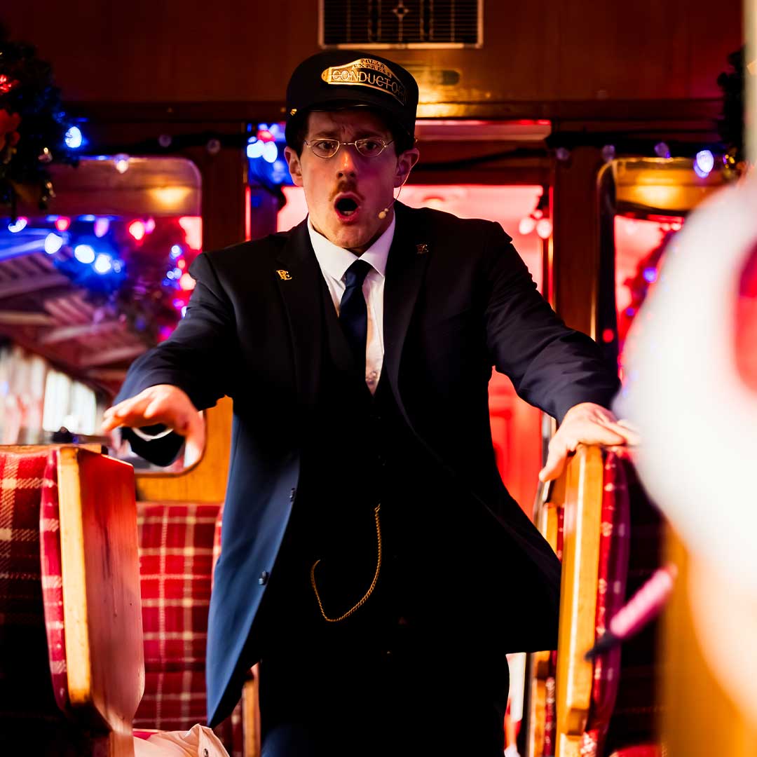 conductor on board the polar express train ride buckfastleigh