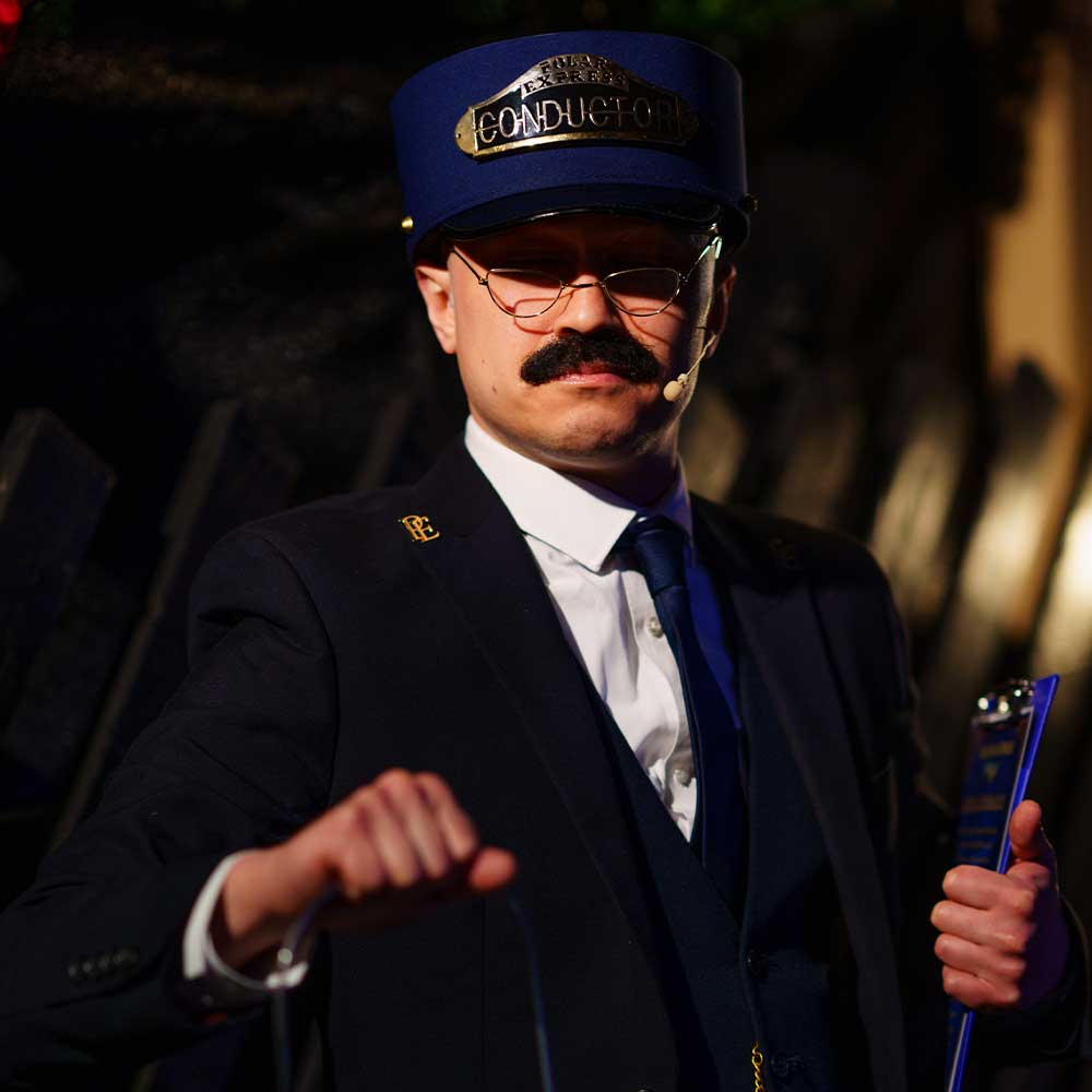 conductor with lantern on the polar express train ride Leeming Bar