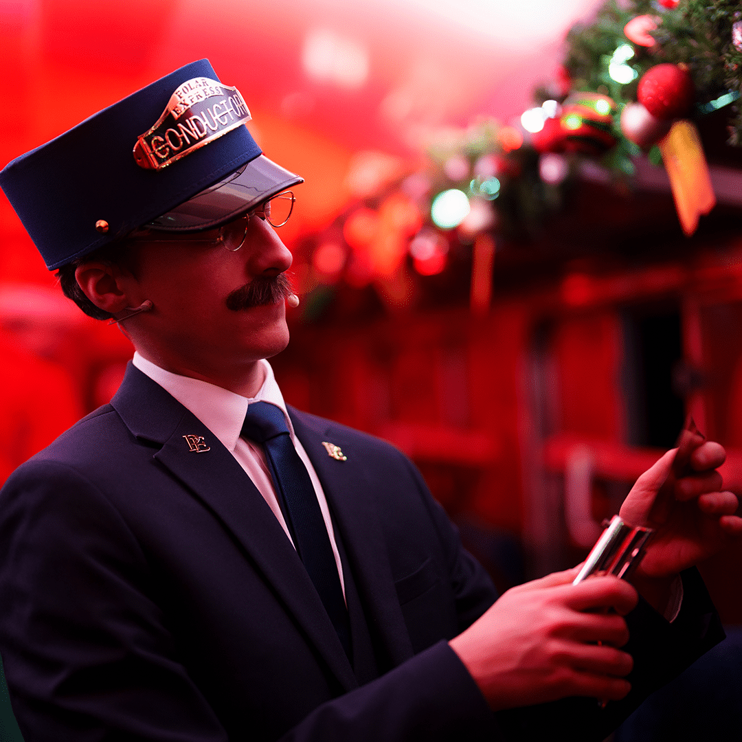 conductor on board the polar express train ride tunbridge wells